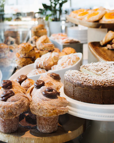 Fresh pastries and cake on the counter